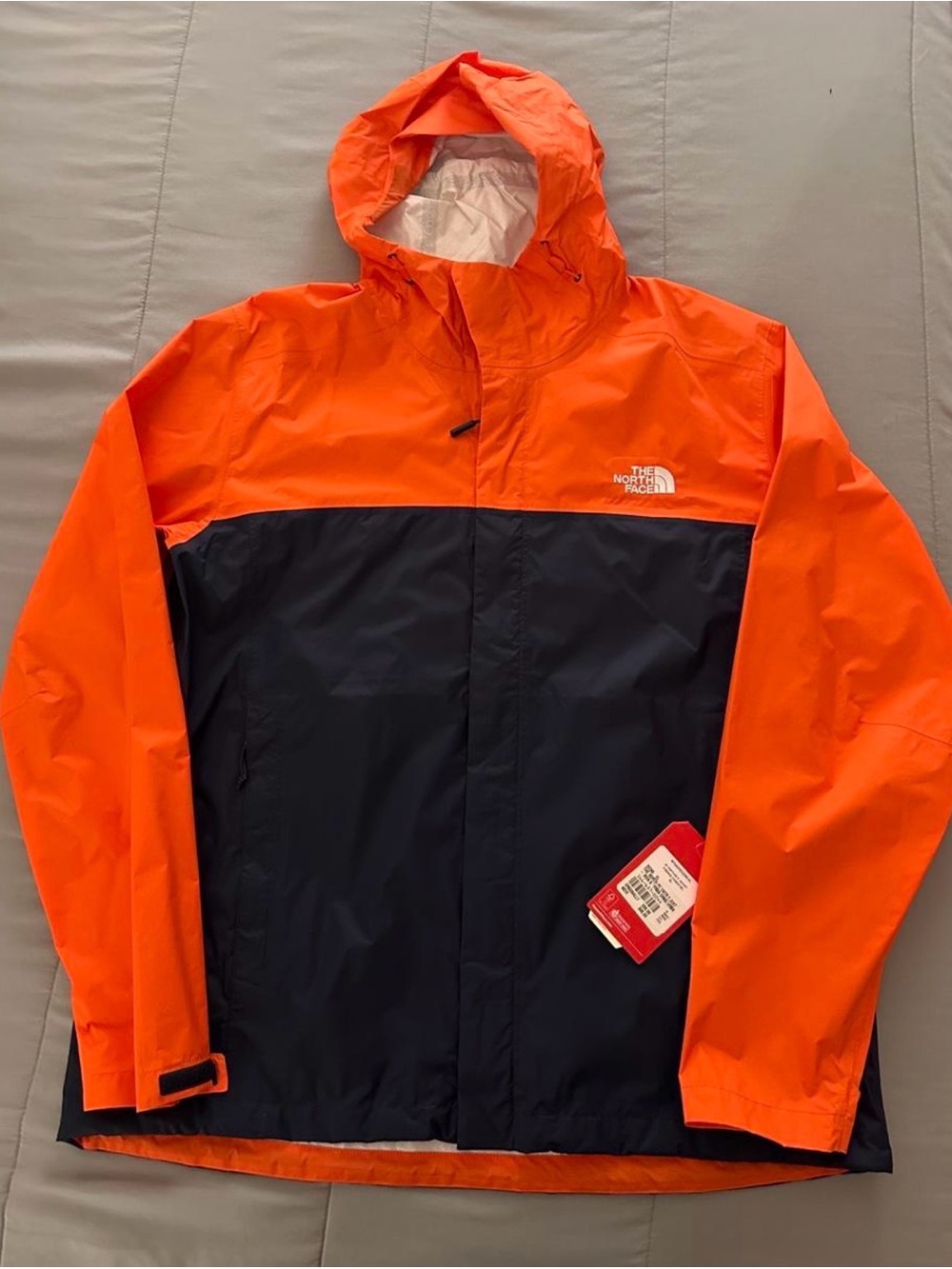 The North Face Orange and Black Waterproof Hooded Rain Jacket